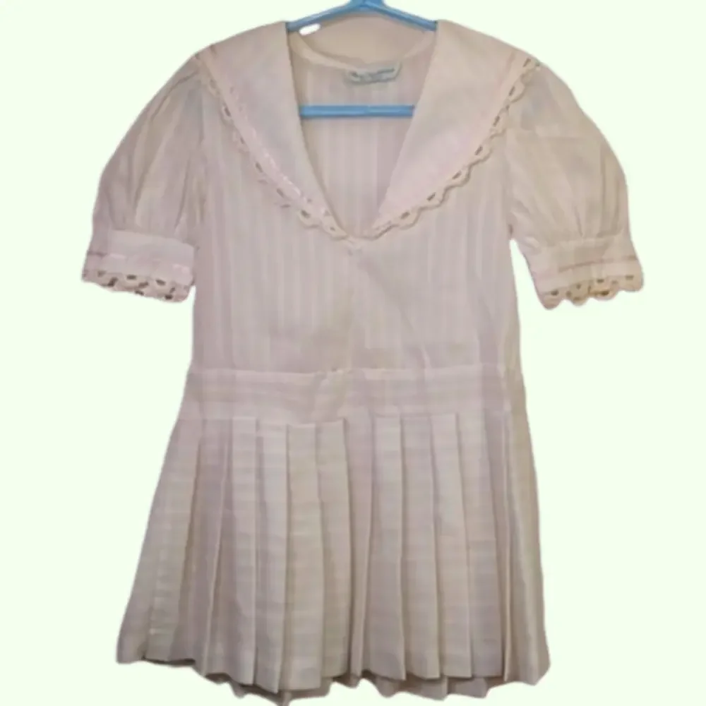 Vintage dress. Ivory with pink ribbon accent. - Picture 1 of 8